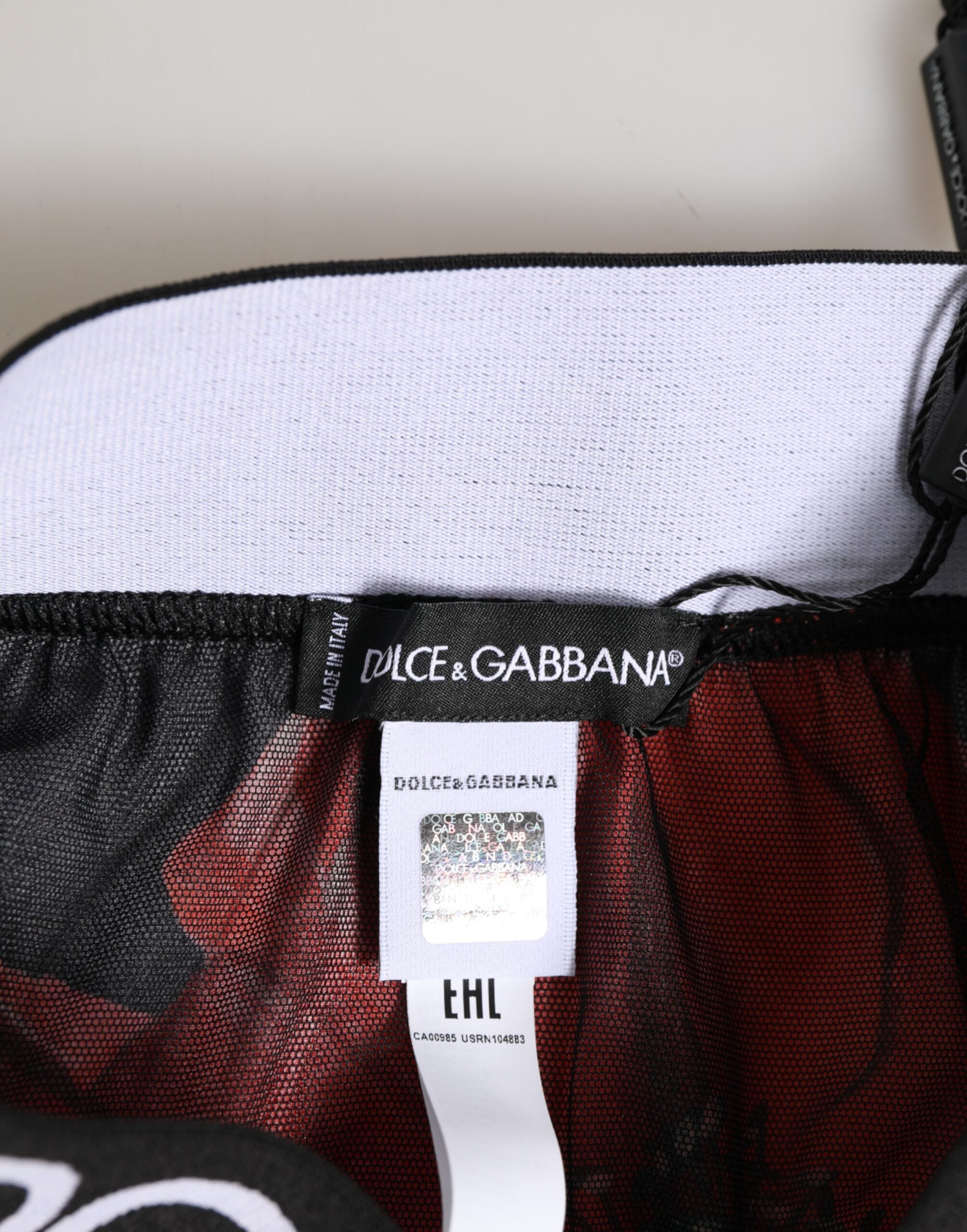 Culotte en soie noire à fleurs Dolce & Gabbana, taille haute, sous-vêtements élégants avec motif floral.