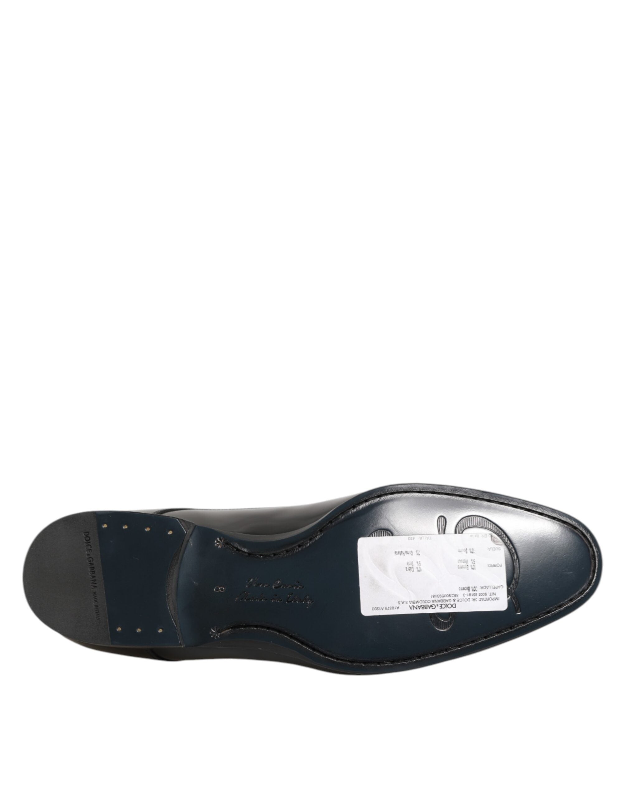 Chaussures Derby pour homme en cuir de veau noir de Dolce & Gabbana, élégantes et sophistiquées, vue de face.