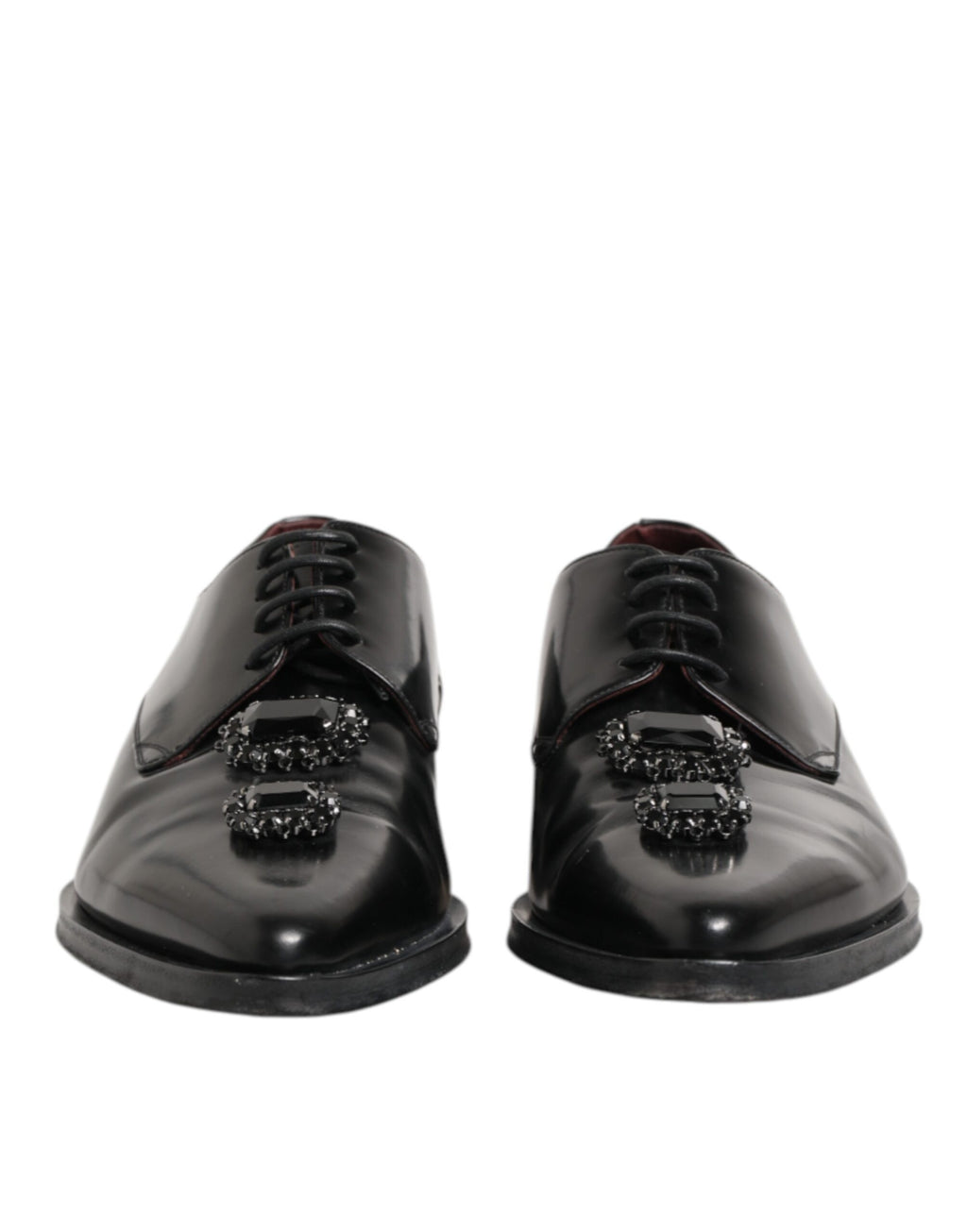 Chaussures derby en cuir noir Dolce & Gabbana avec bijoux et cristaux, style élégant et sophistiqué.
