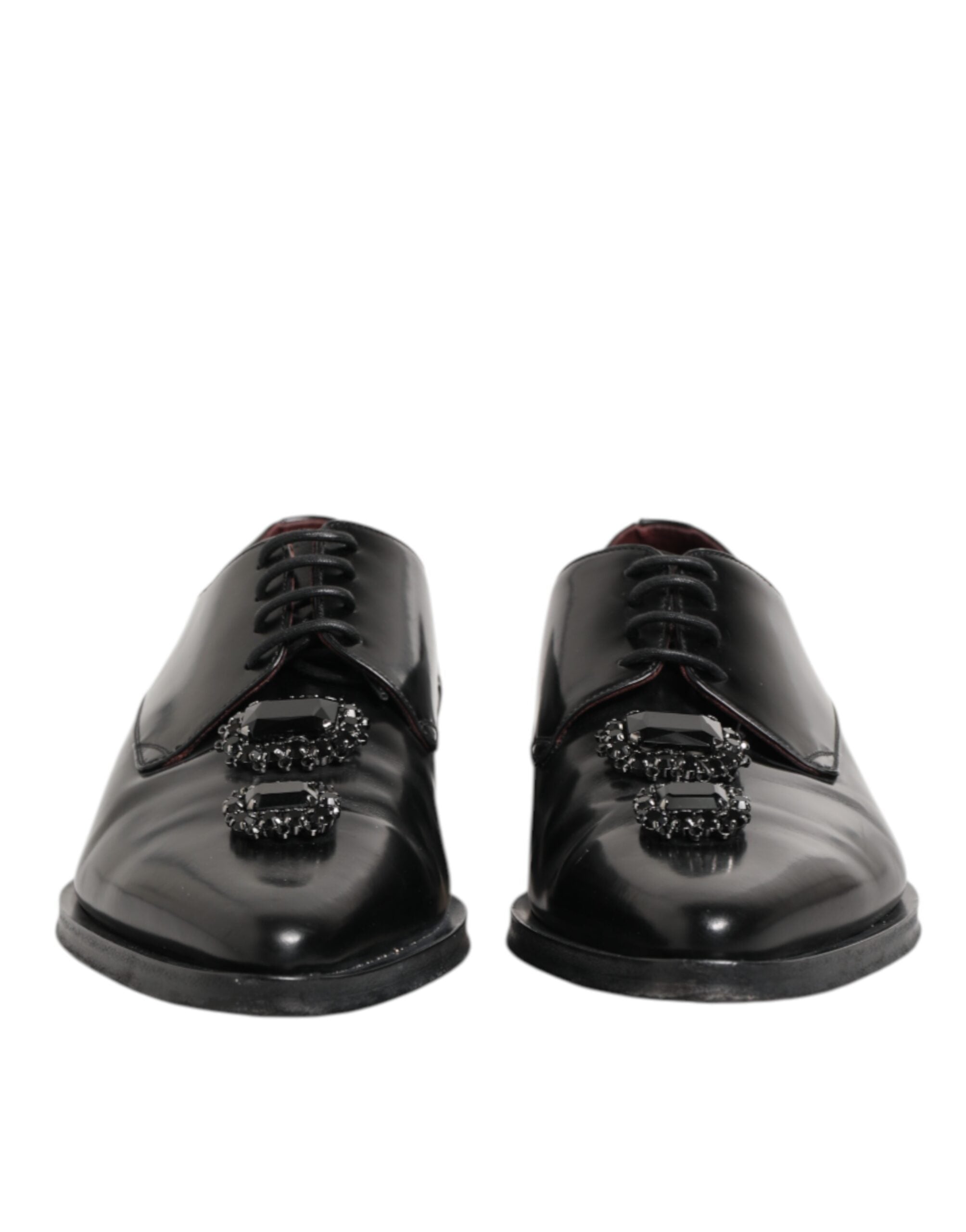 Chaussures derby en cuir noir Dolce & Gabbana avec bijoux et cristaux, style élégant et sophistiqué.