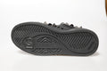 Chaussures sneakers pour homme Dolce & Gabbana Portofino noires avec studs, vue en gros plan sur le dessus.