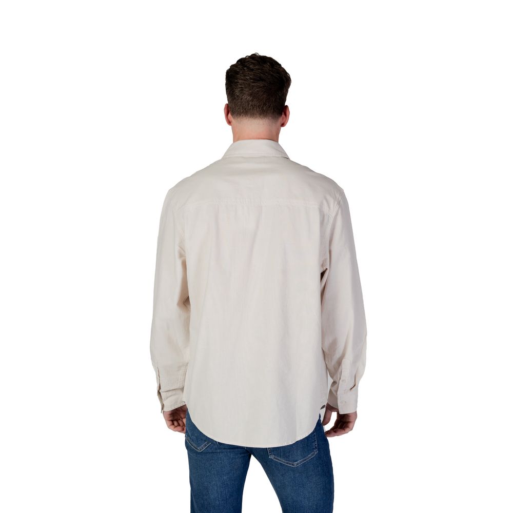 Chemise beige en coton recyclé de Calvin Klein Jeans, vue de face, détails du tissu durable et style décontracté.