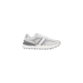 Chaussures Tommy Hilfiger Jeans gris en daim et cuir pour sport, avec semelle blanche et design athlétique.
