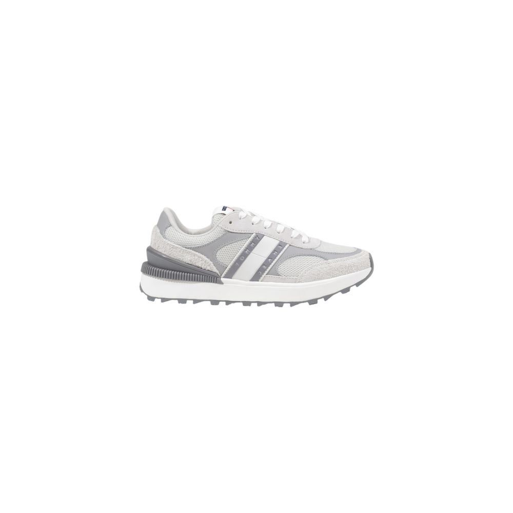 Chaussures Tommy Hilfiger Jeans gris en daim et cuir pour sport, avec semelle blanche et design athlétique.