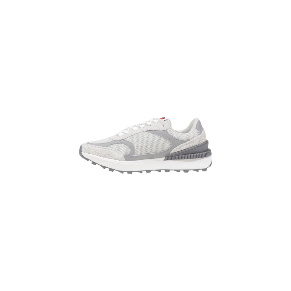 Sneakers athlétiques Tommy Hilfiger Jeans en daim gris avec détails en cuir, chaussures confortables pour le sport et la casual.