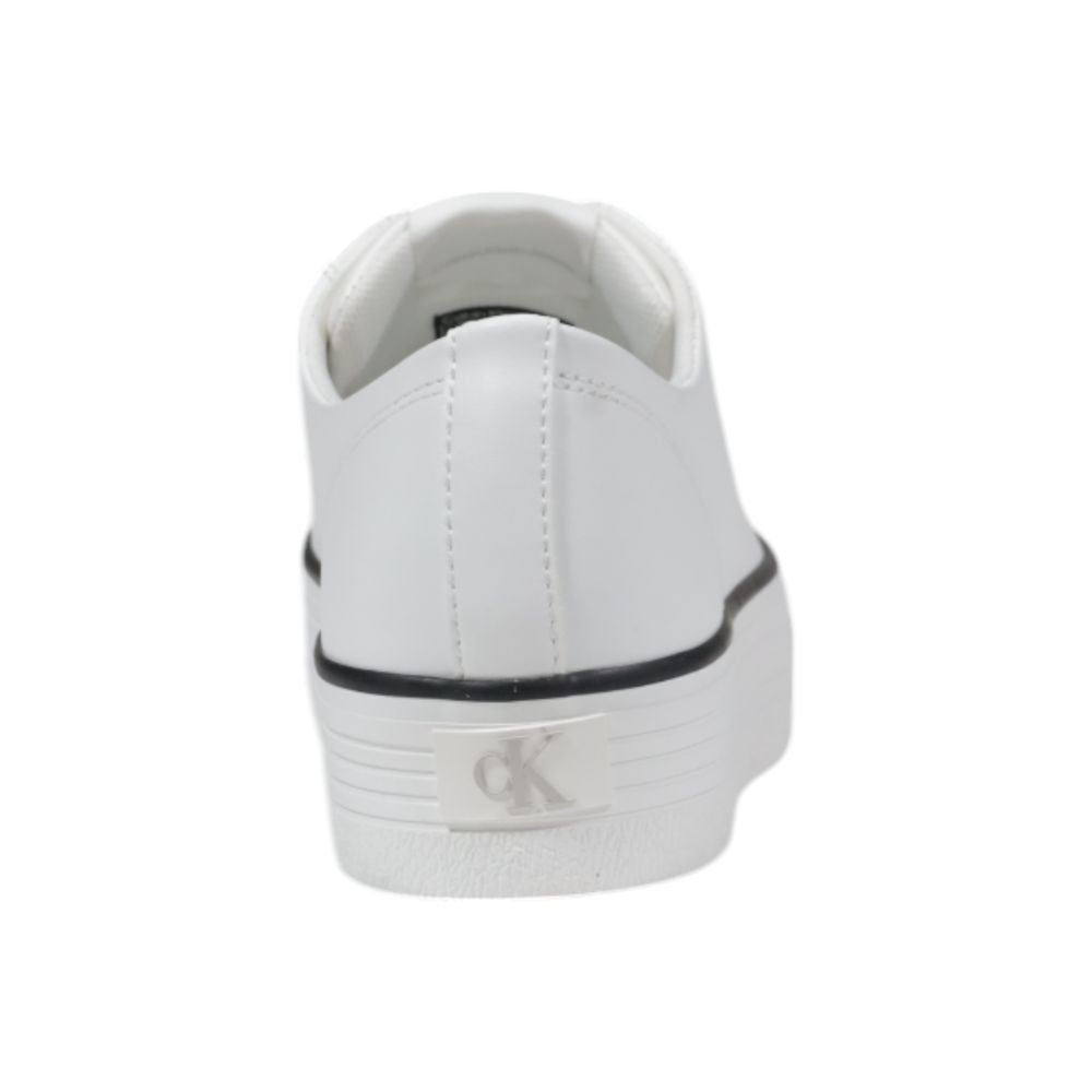 Sneakers plateforme en cuir noir et blanc de Calvin Klein Jeans, chaussures tendance avec semelle épaisse.