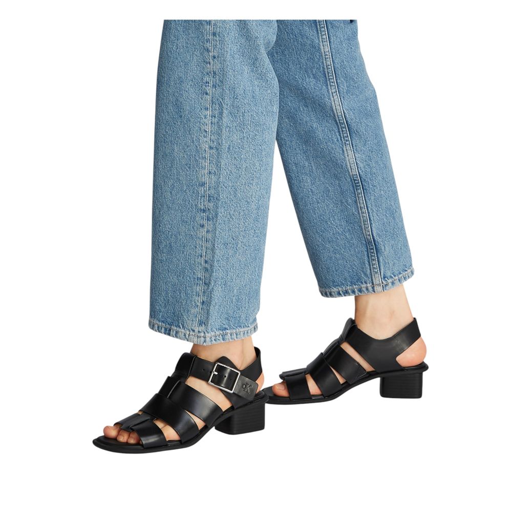 Sandales plates en polyester noir de Calvin Klein Jeans, vues de dessus, avec bride fine et semelle plate, pour un style décontracté.