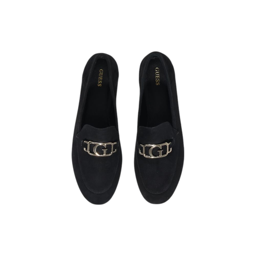 Chaussures Guess à plateforme en cuir noir, talons hauts et design élégant, parfaites pour une tenue sophistiquée.