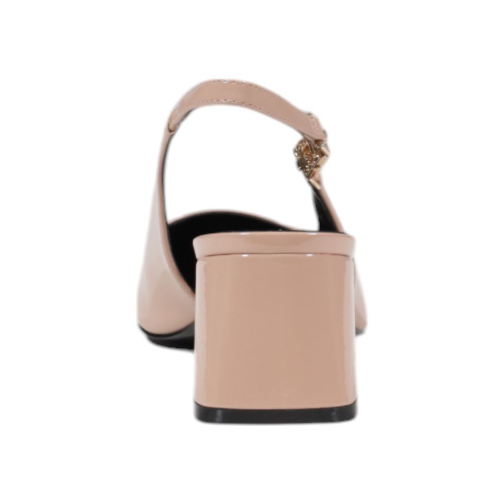 Sandales plateforme en polyéthylène rose de Guess, vue de côté, avec semelle épaisse et bride à l'avant.