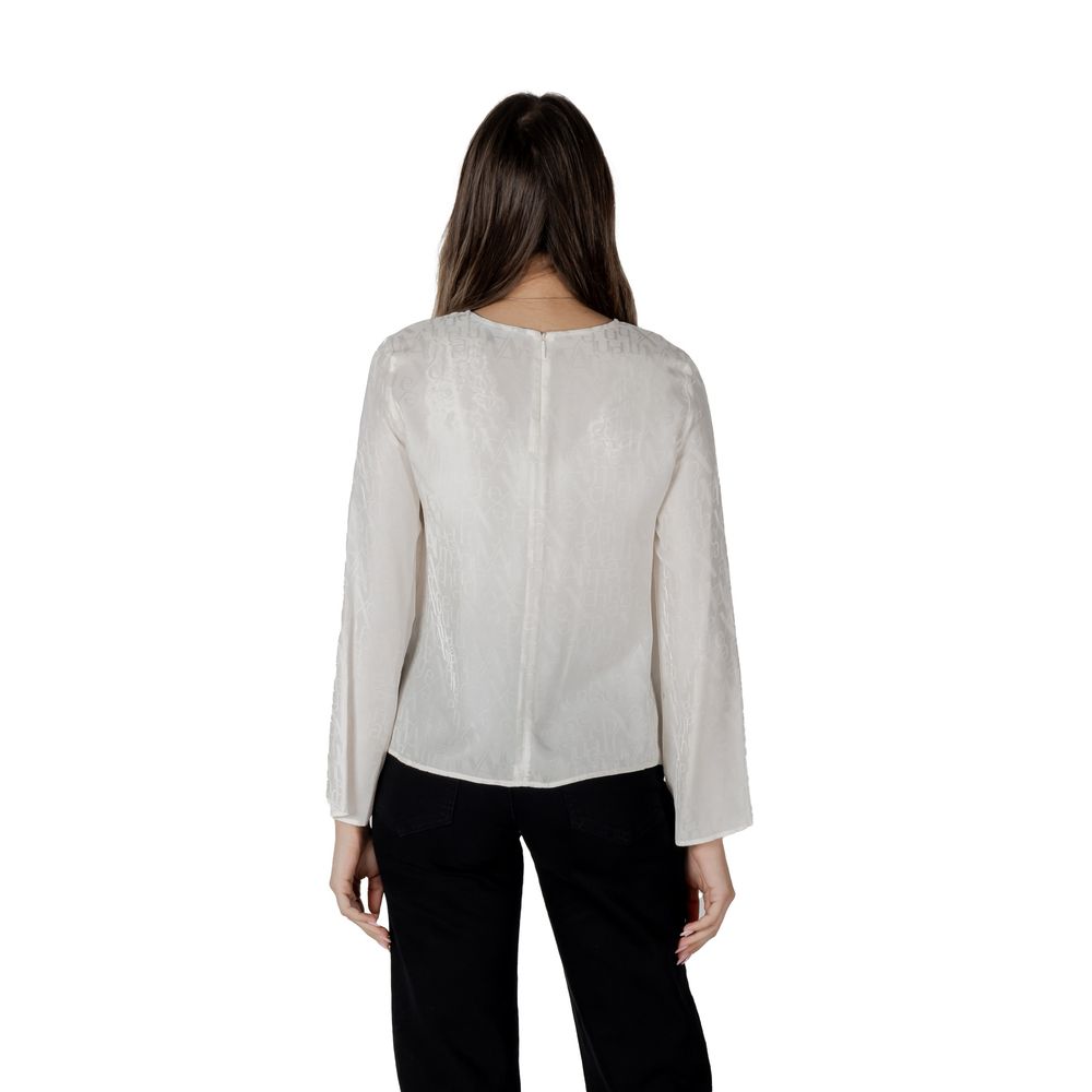 Blouse en viscose couleur crème de la marque Armani Exchange, style élégant avec col et manches longues.