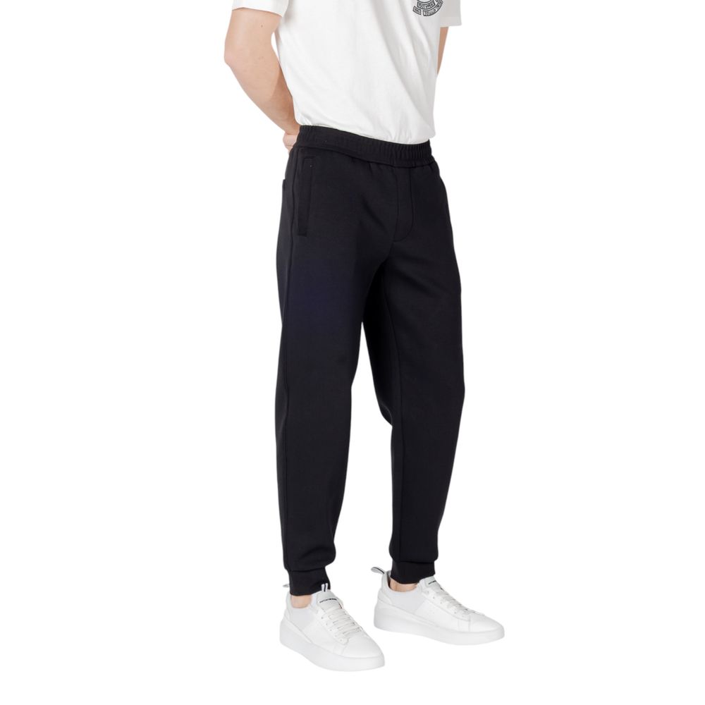 Pantalon de jogging en coton noir Armani Exchange pour homme, style décontracté et confortable pour l'entraînement ou la détente.