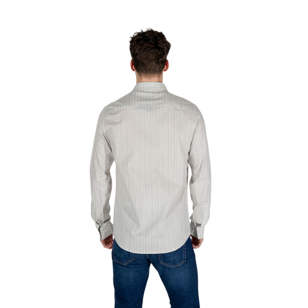 Chemise en coton crème à motif de la marque Armani Exchange, avec col et manches longues, vue de face.