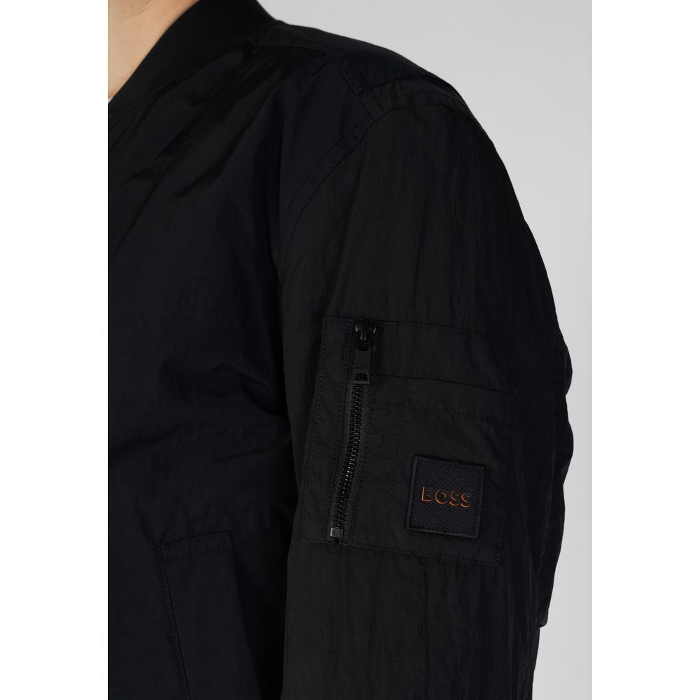 Veste bomber noire en polyamide de Hugo Boss, coupe ajustée avec détails modernes, vue de face sur fond blanc.