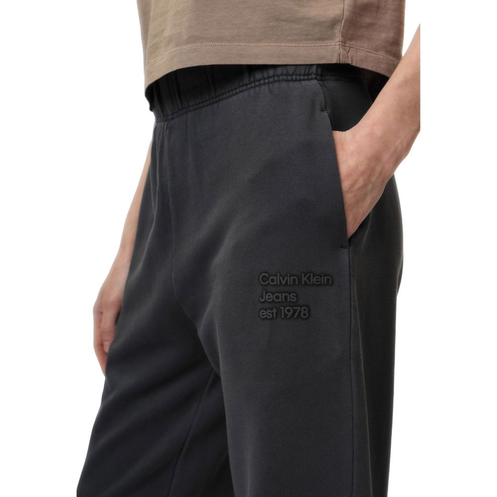 Pantalons de jogging en coton gris Calvin Klein Jeans pour homme, style décontracté et confortable.