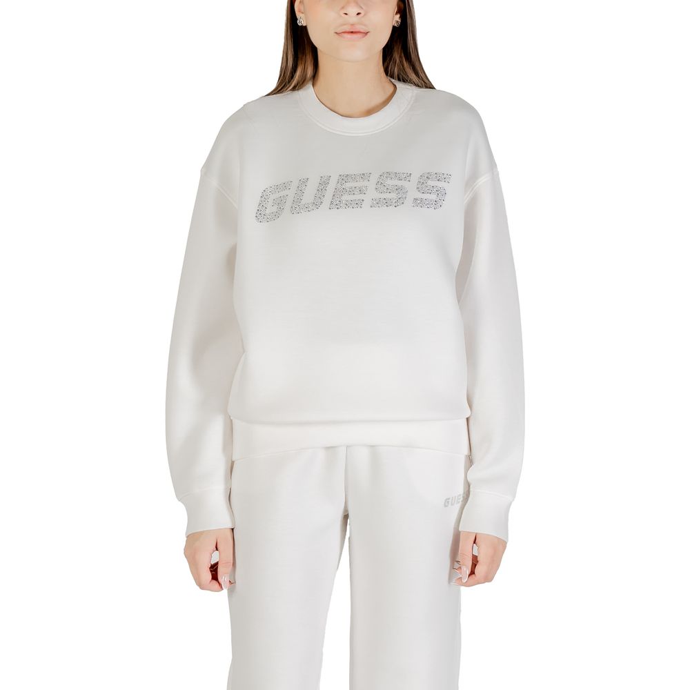 Sweatshirt Guess Active en viscose beige avec logo Guess Active sur la poitrine, porté par un mannequin.