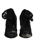 Chaussures Dolce & Gabbana à talons noirs en dentelle stretch, bottes mi-mollet élégantes et sophistiquées.