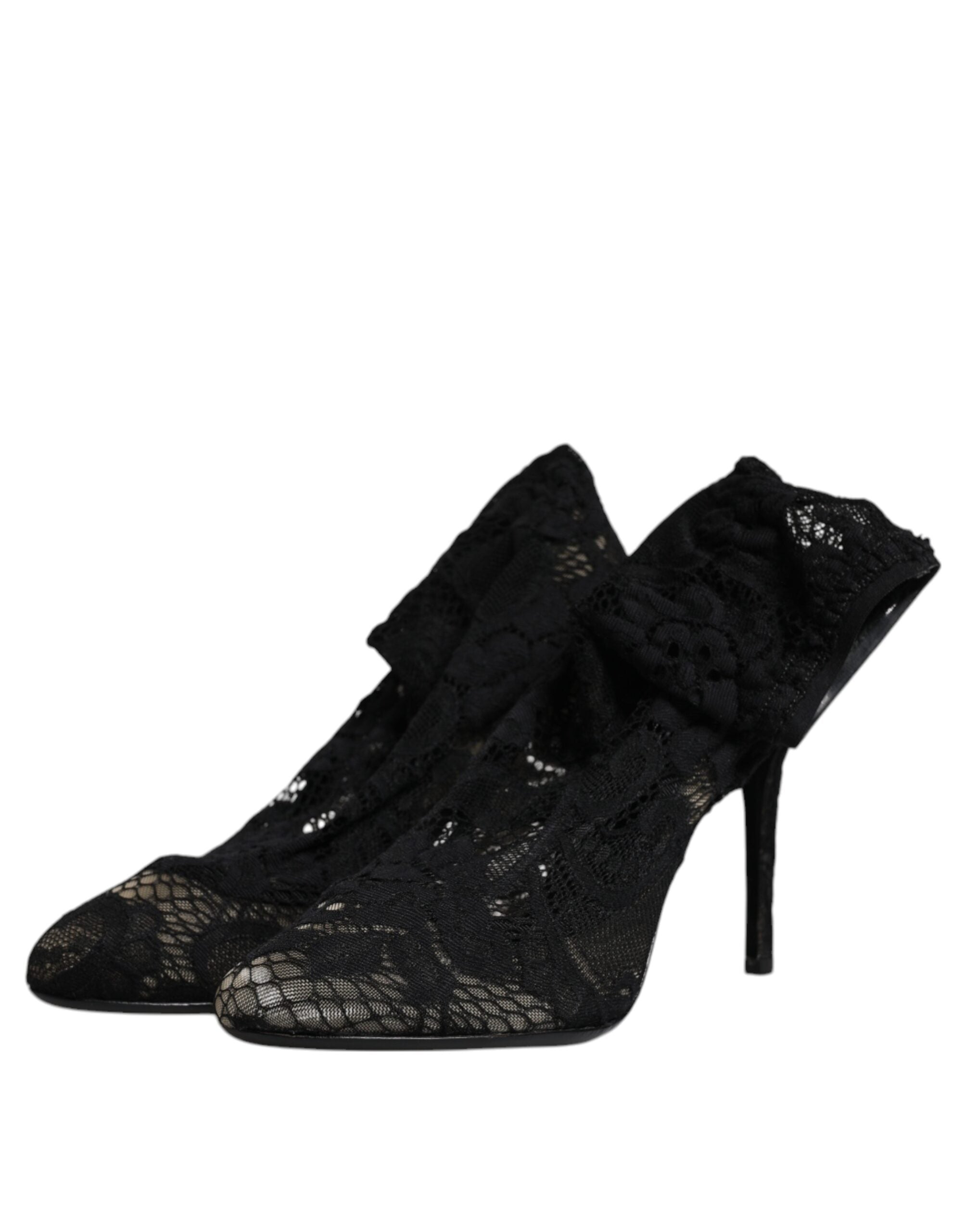 Chaussures Dolce & Gabbana à talons noirs en dentelle stretch, bottines mi-mollet élégantes et sophistiquées.