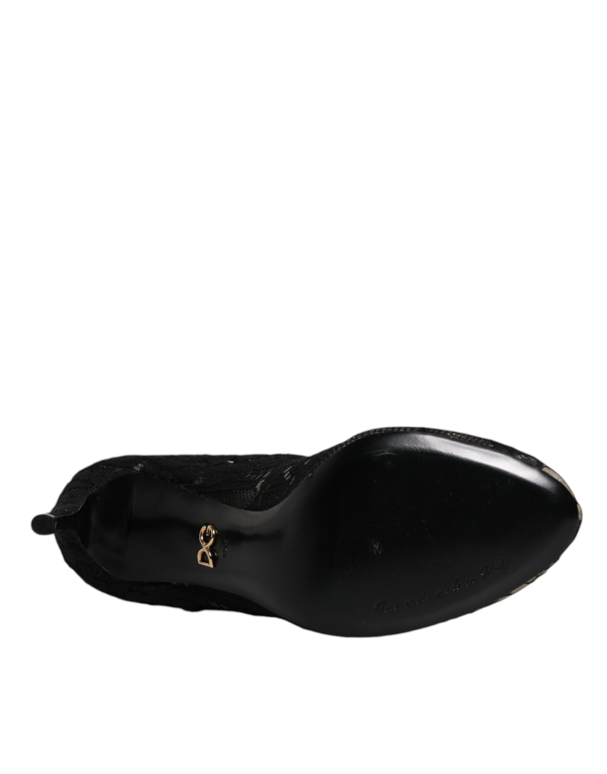 Chaussures Dolce & Gabbana à talons noirs en dentelle stretch, bottines mi-mollet élégantes et raffinées.
