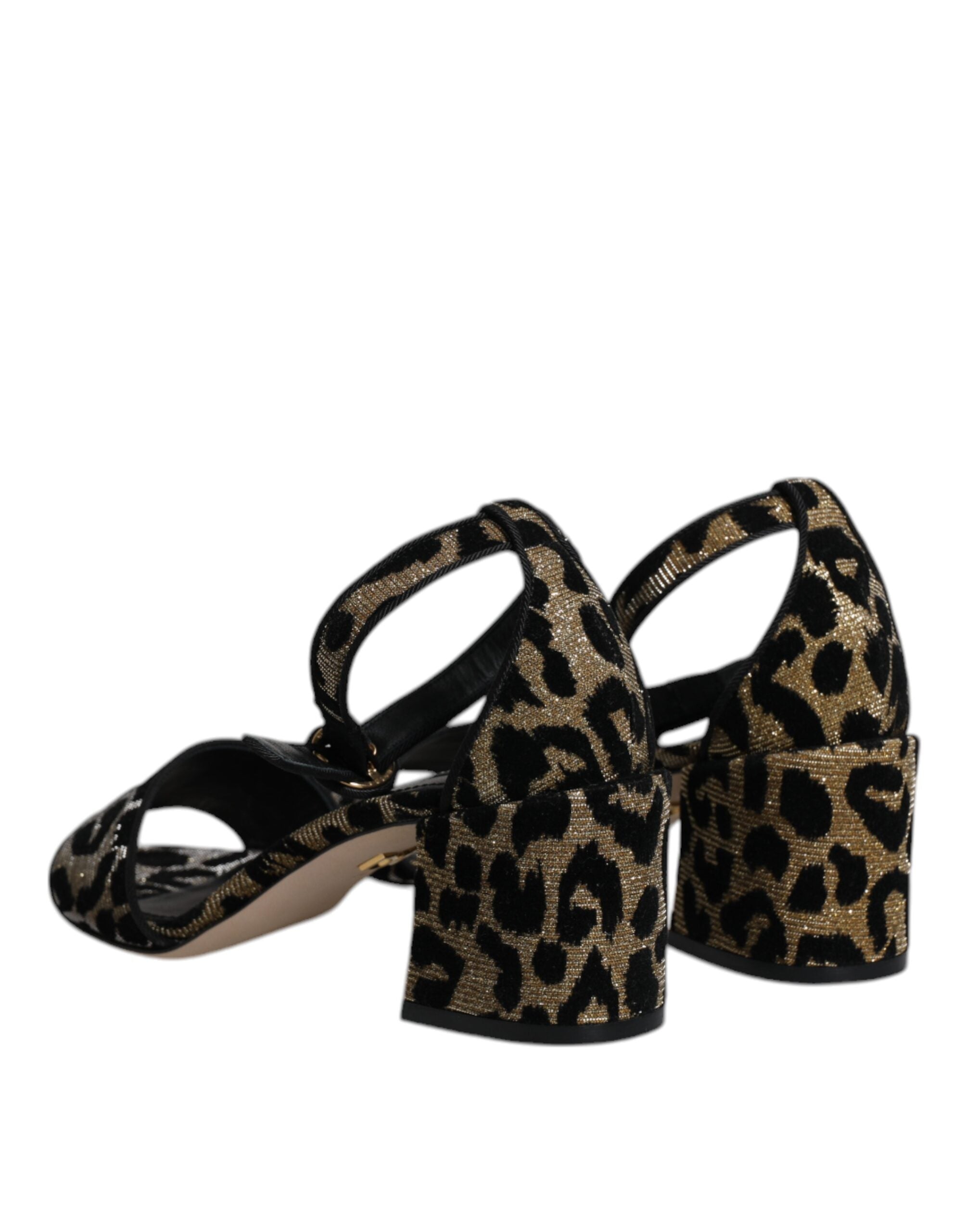 Sandales à talons dorés Dolce & Gabbana avec bride à la cheville et motif léopard, vue de côté.