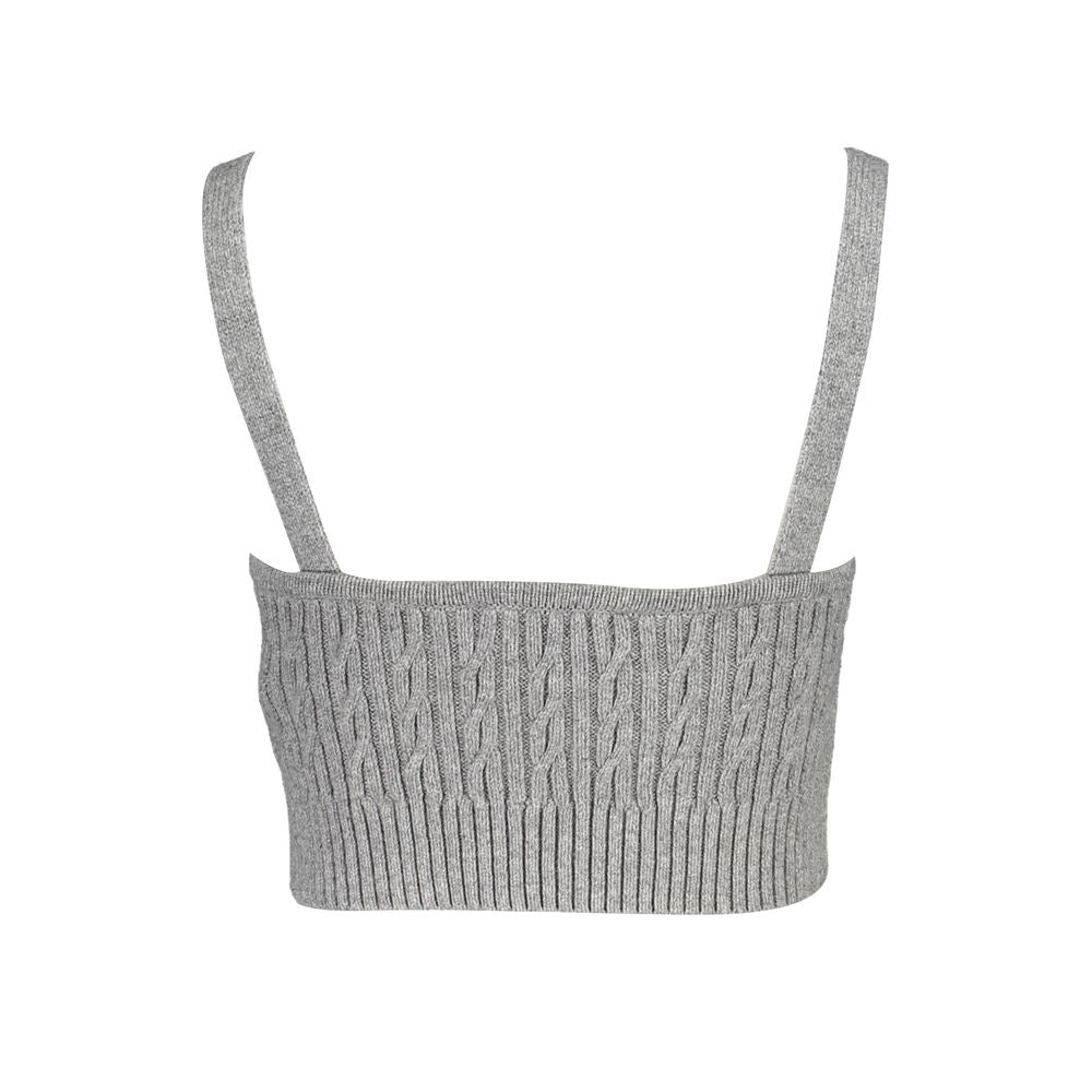Sac à main en polyuréthane noir pour femmes de Tommy Hilfiger, avec détails élégants et poignées ajustables.