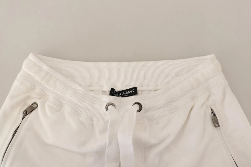 Pantalon de jogging Dolce & Gabbana en coton blanc avec logo brodé, style décontracté et confortable.