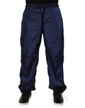 Pantalon de jogging en nylon bleu Dolce & Gabbana, coupe droite, style décontracté avec ceinture élastique et poches latérales.