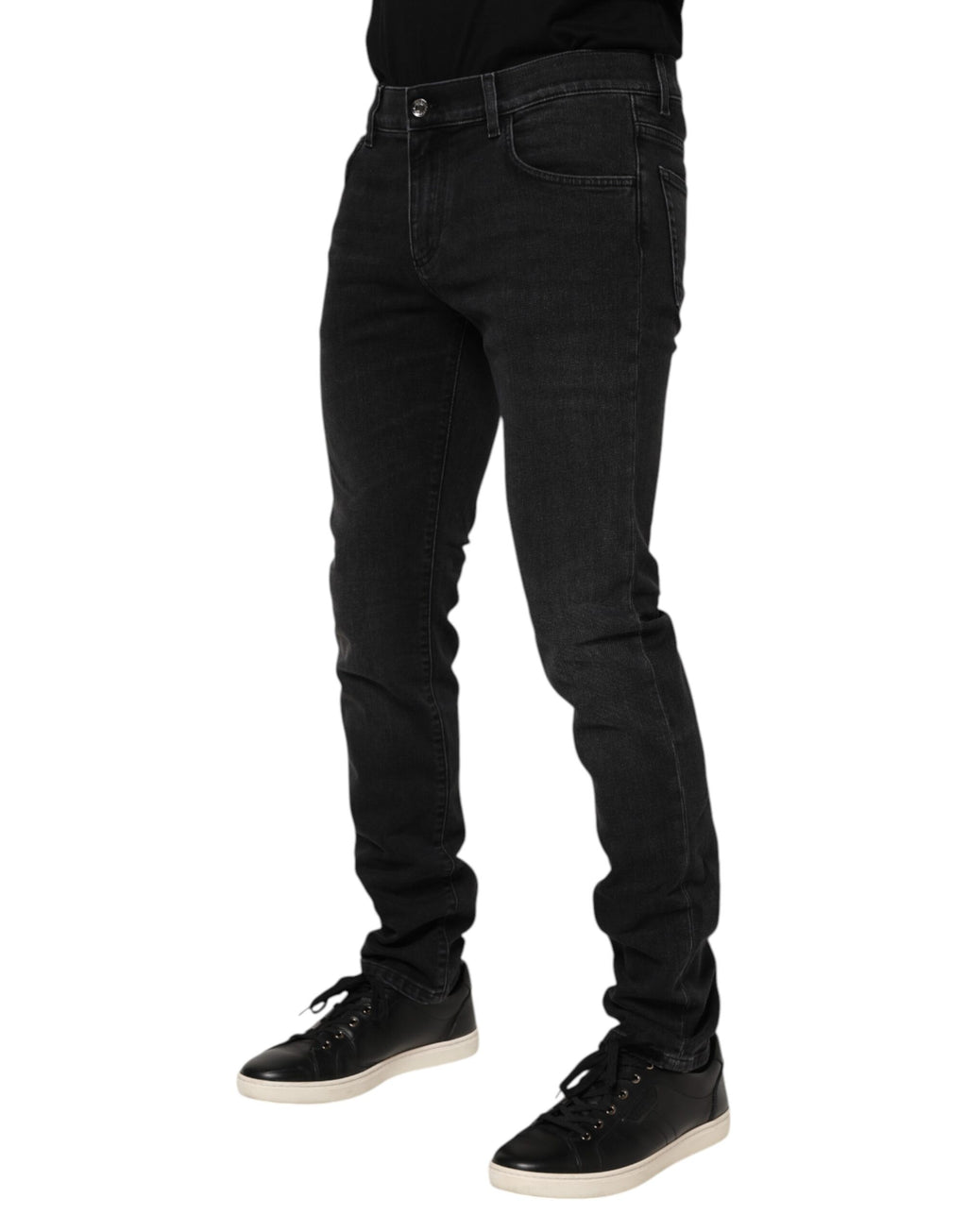 Pantalon homme Dolce & Gabbana en coton noir, coupe skinny, style denim, jeans ajustés, visible sur le mannequin.