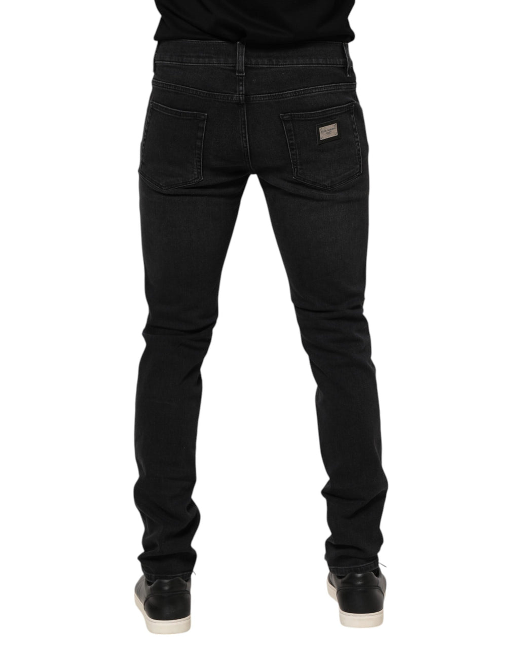 Jeans slim en coton noir Dolce & Gabbana pour homme, pantalon en denim ajusté avec détails modernes.