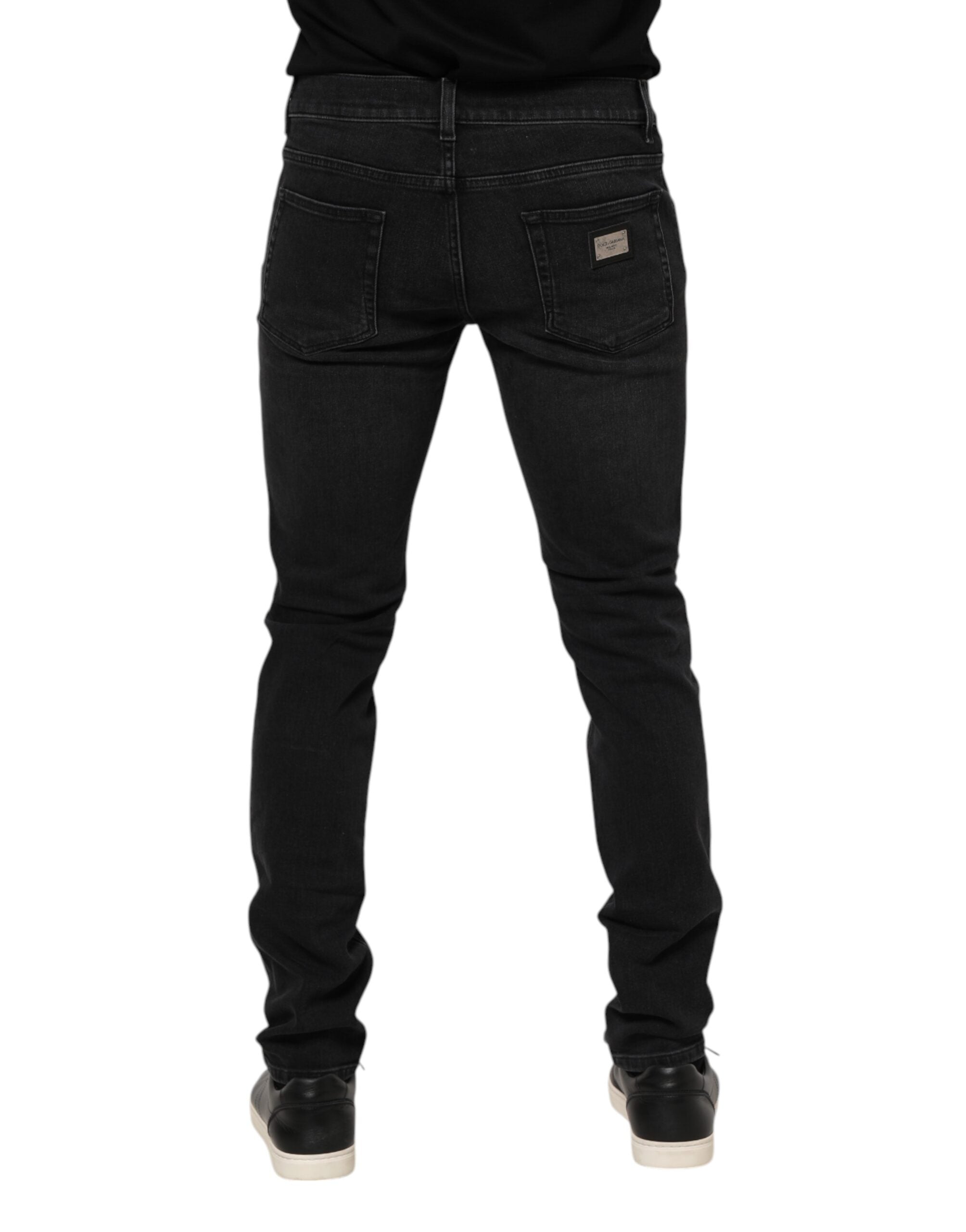 Jeans slim en coton noir Dolce & Gabbana pour homme, pantalon en denim ajusté avec détails modernes.