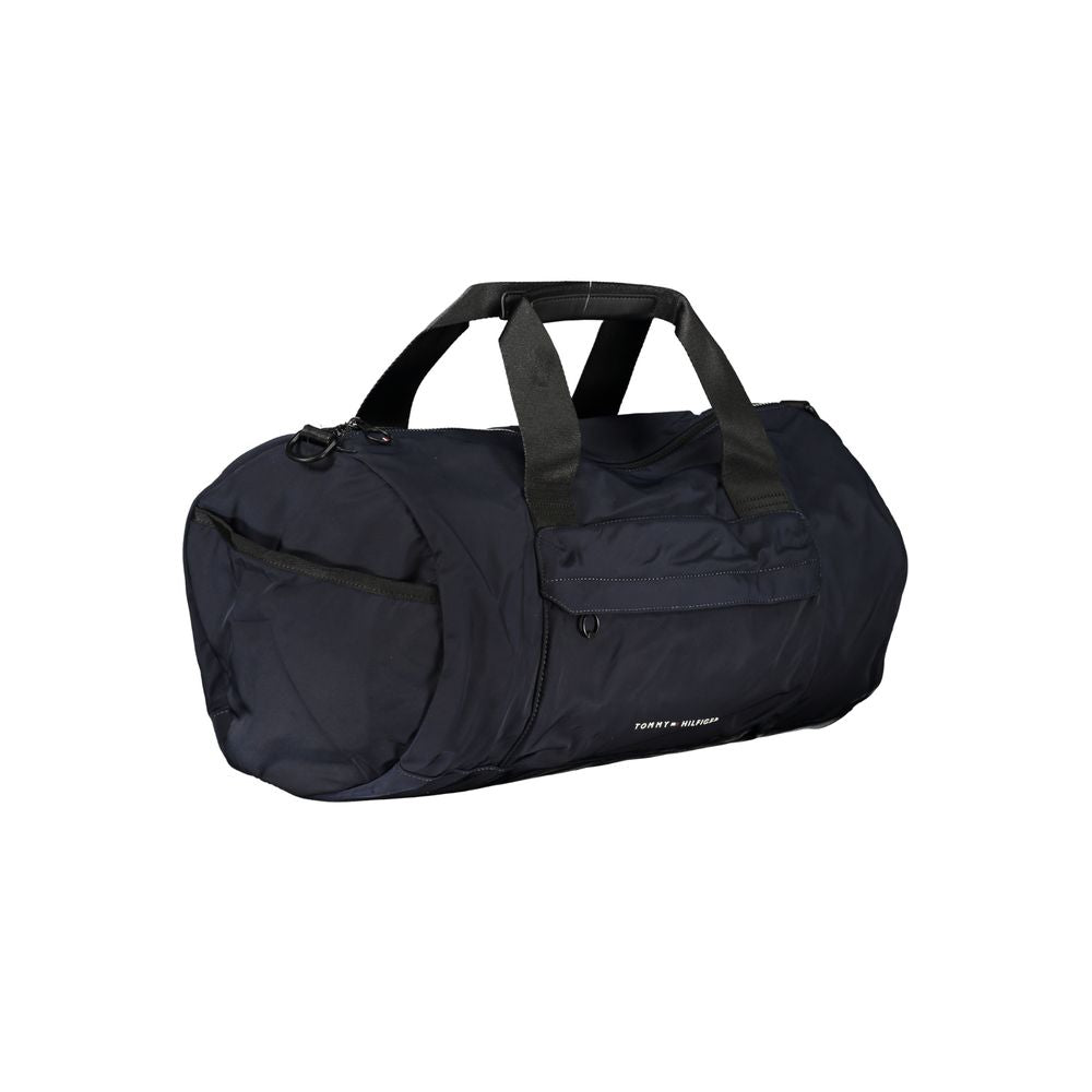 Sac homme Tommy Hilfiger en polyester bleu avec bandoulière réglable, pratique et élégante pour un usage quotidien.