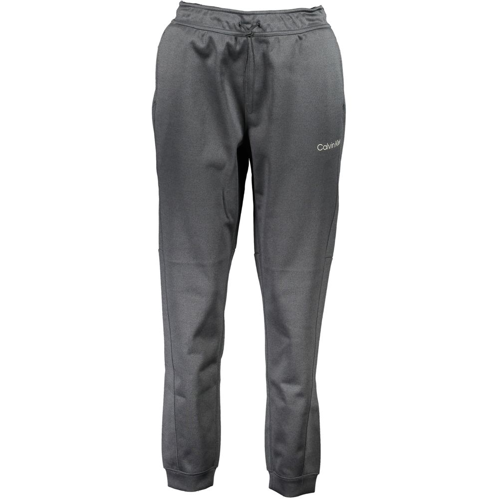 Pantalon de sport pour femmes Calvin Klein en polyester noir, style décontracté et confortable.