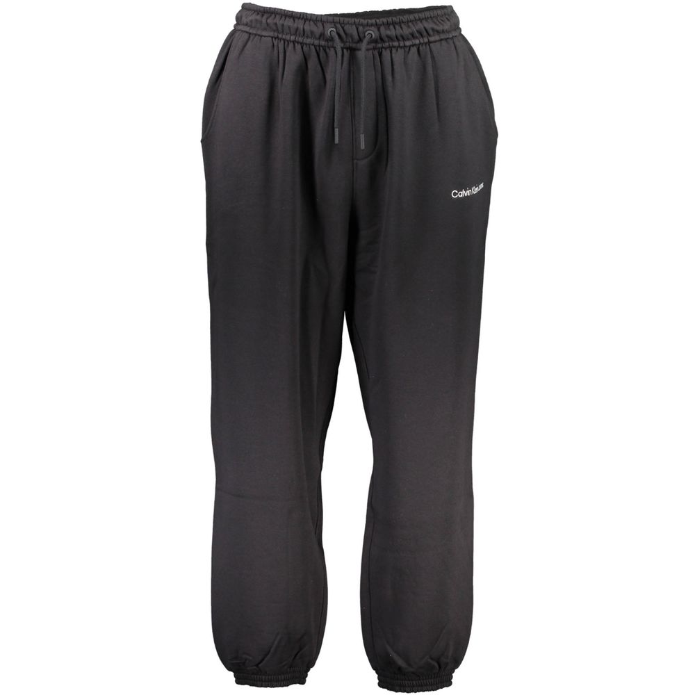 Pantalon de sweat noir pour homme de la marque Calvin Klein en coton, avec taille élastique et poches latérales.