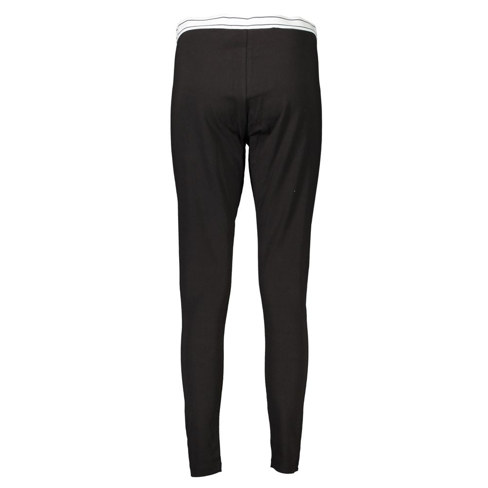 Leggings femme en coton noir de Tommy Hilfiger, ajustés et confortables, visibles sur un fond neutre.