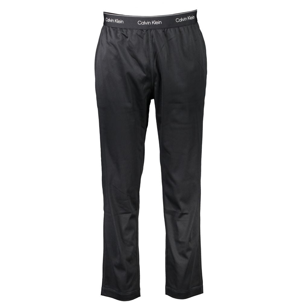 Pantalon de survêtement pour homme Calvin Klein en polyester noir, coupe décontractée, style sportif et confortable.