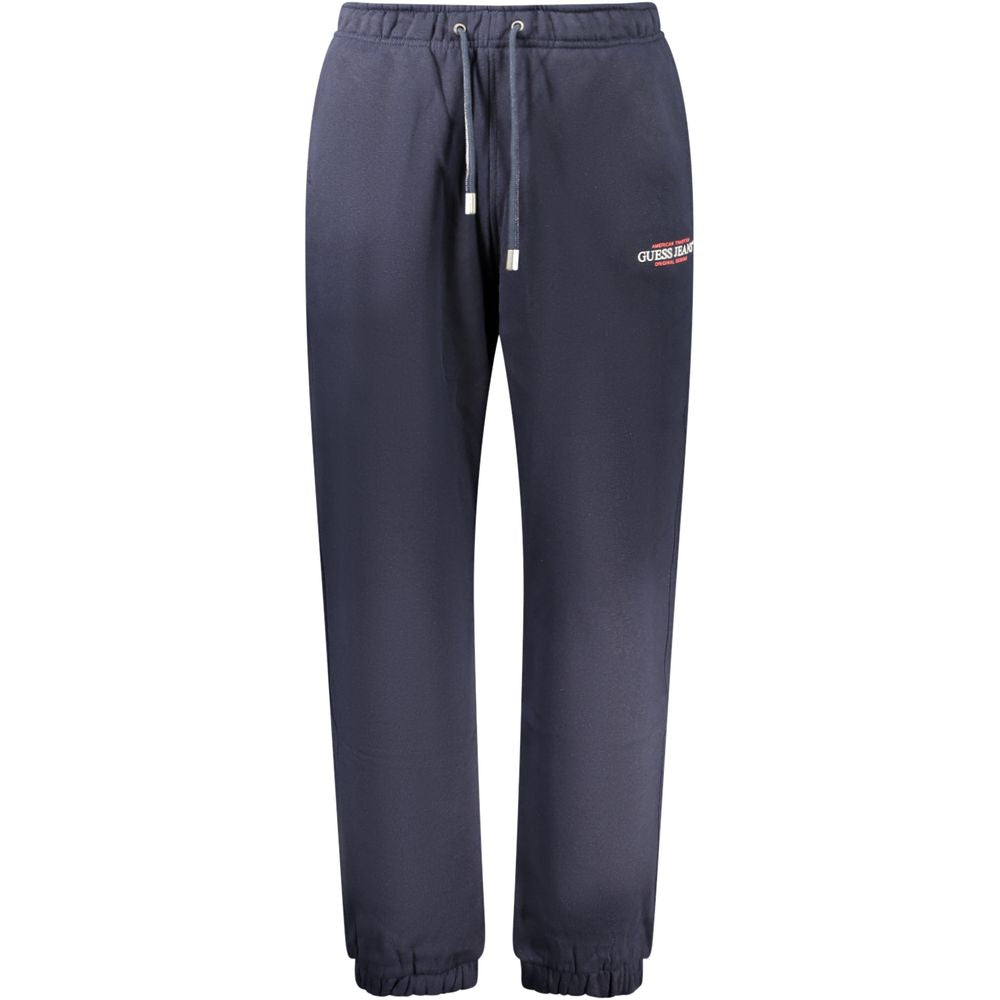Pantalon de survêtement homme Guess Jeans en coton bleu, style décontracté avec logo Guess sur la jambe.