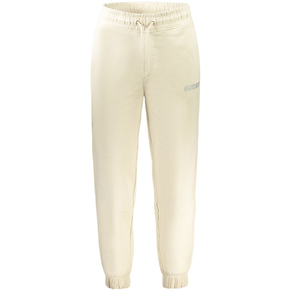 Pantalon de survêtement en coton beige pour homme de Guess Jeans, coupe décontractée et style confortable.