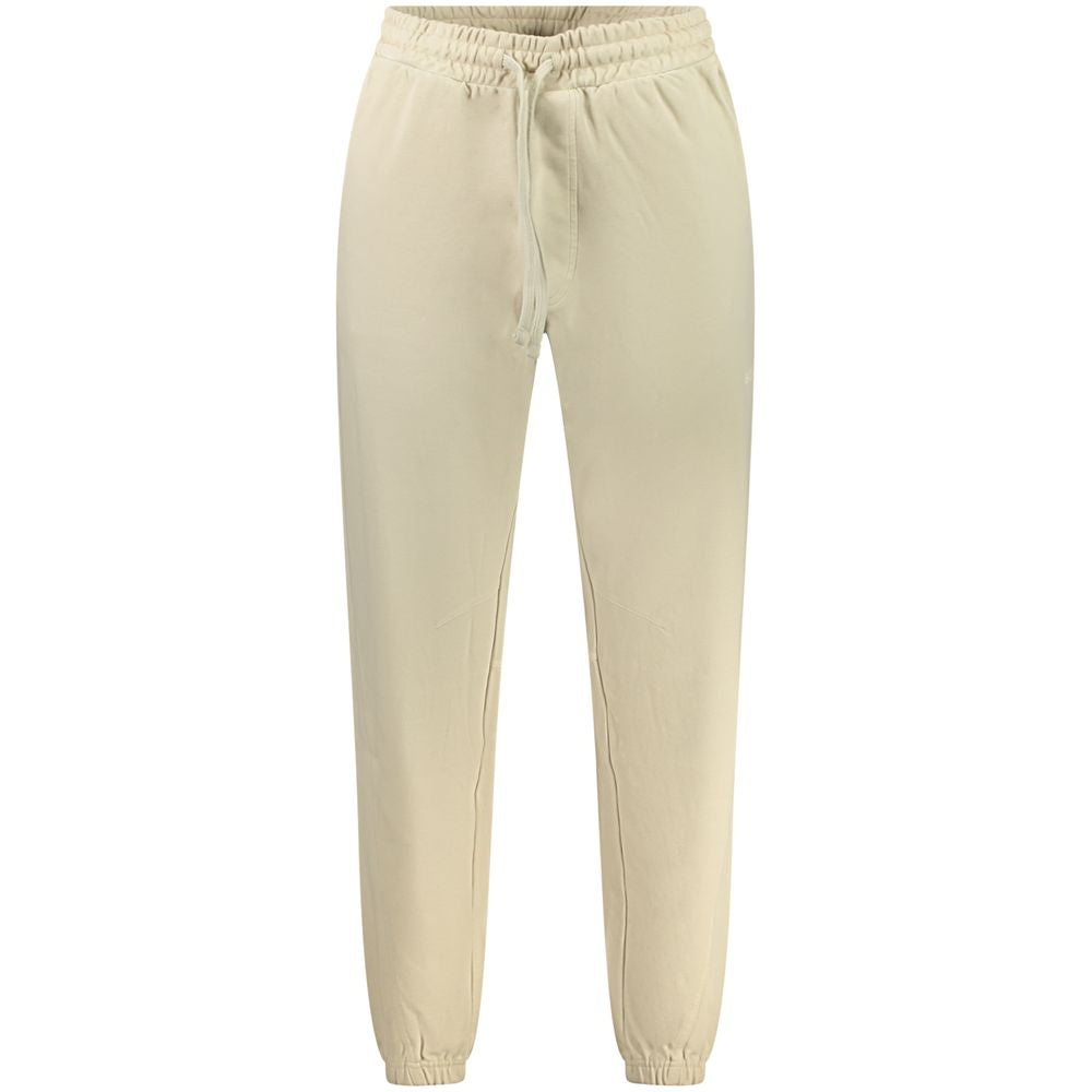 Pantalon de sport beige en coton pour homme de la marque Hugo Boss, coupe confortable et style décontracté.