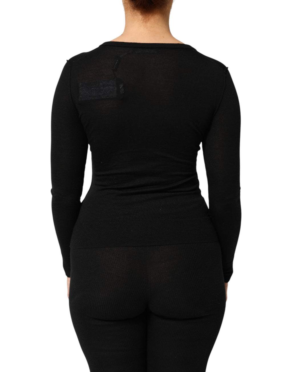 Cardigan noir en laine vierge de Dolce & Gabbana avec boutons, vue détaillée du pull élégant et confortable.