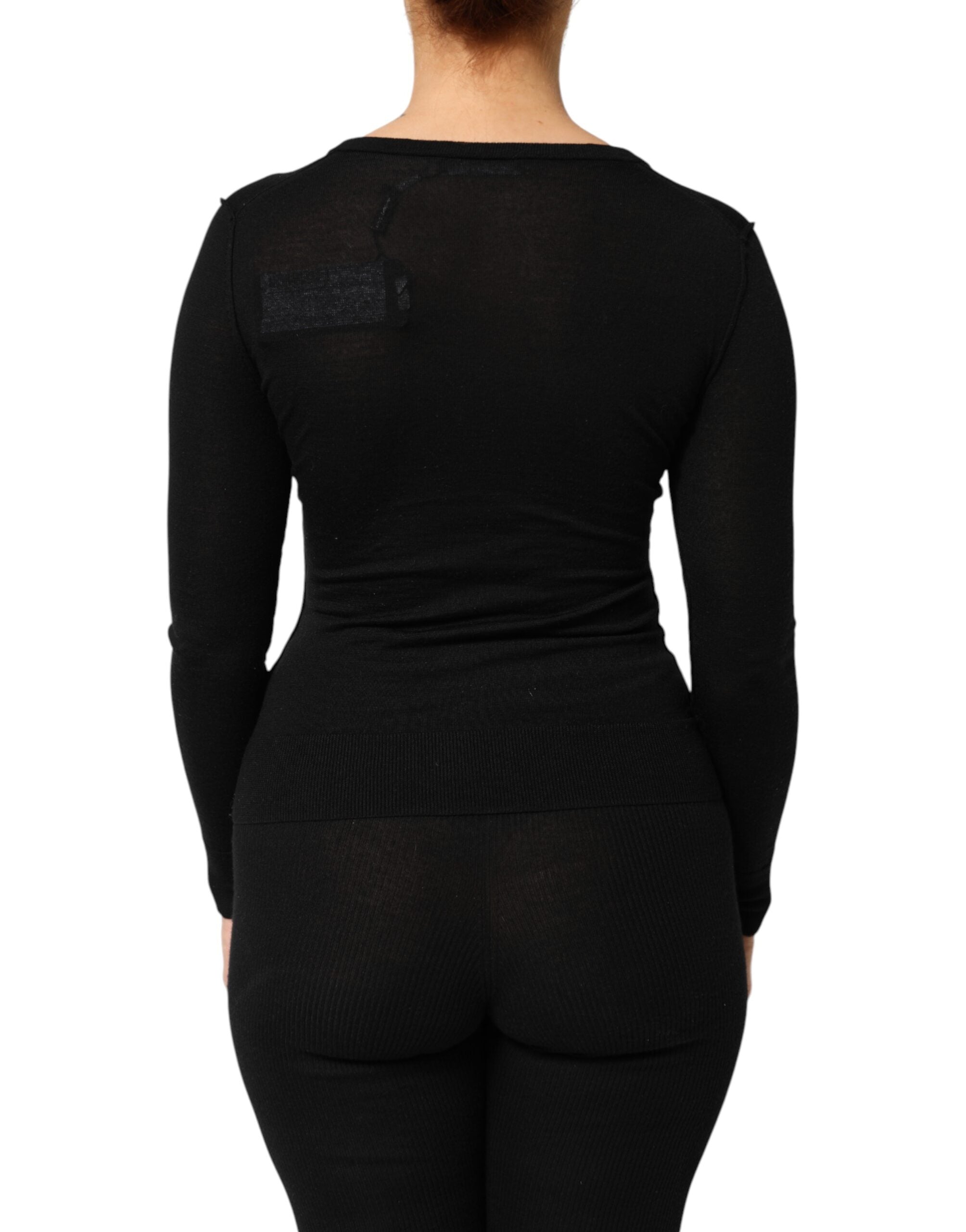 Cardigan noir en laine vierge de Dolce & Gabbana avec boutons, vue détaillée du pull élégant et confortable.