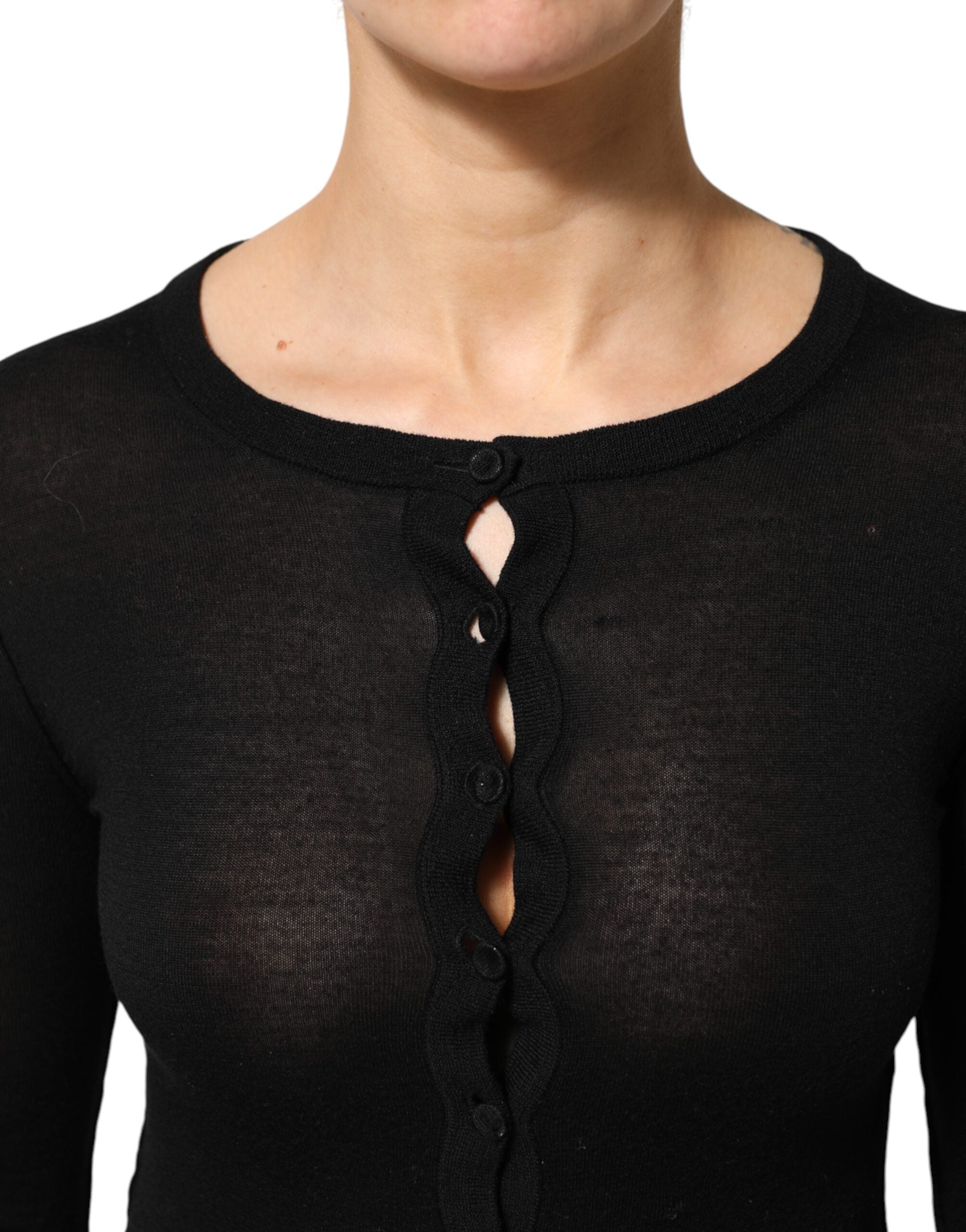 Cardigan noir en laine vierge Dolce & Gabbana avec boutons, à manches longues et coupe classique.
