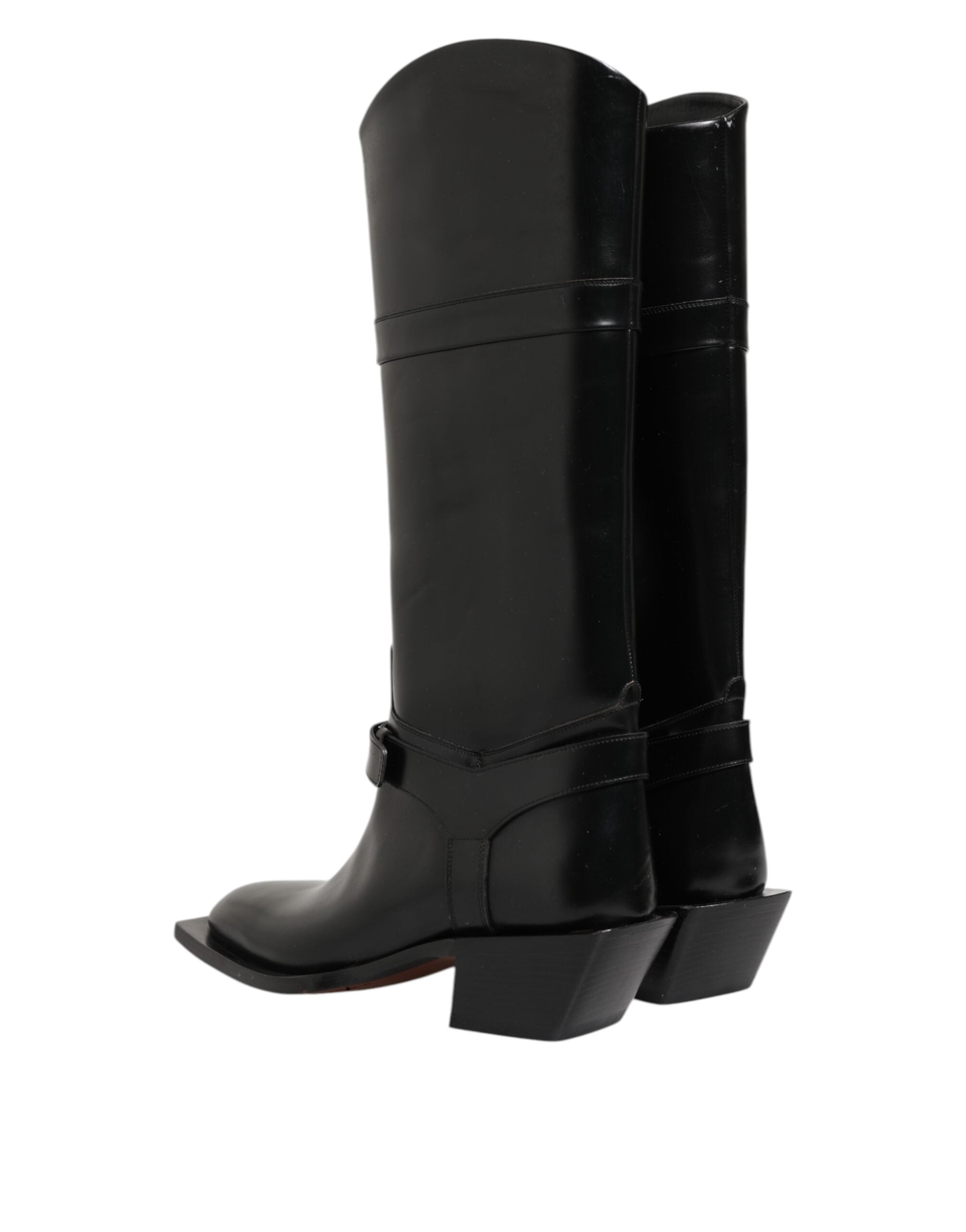 Bottes hautes Dolce & Gabbana noires avec plaque logo, en cuir, style over-the-calf, chaussures élégantes et sophistiquées.