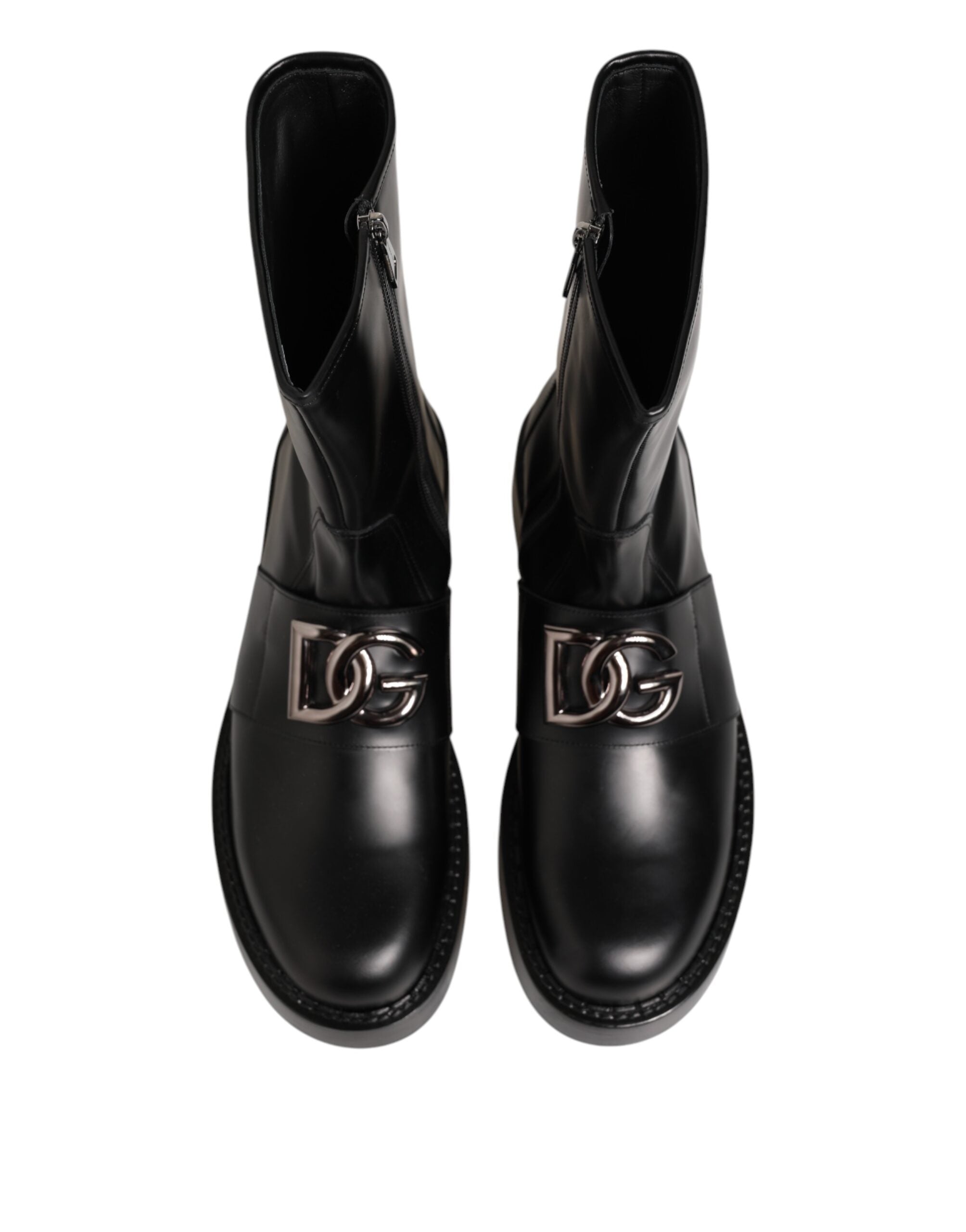 Bottes motardes noires Dolce & Gabbana avec plaque logo, mi-mollet, en cuir, style robuste et tendance.
