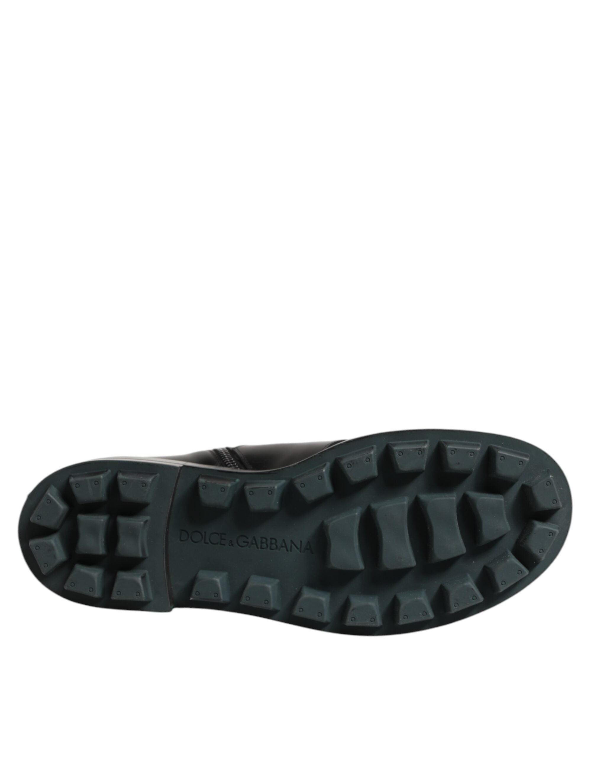 Bottes motardes noires Dolce & Gabbana avec plaque logo en milieu de mollet et style élégant.