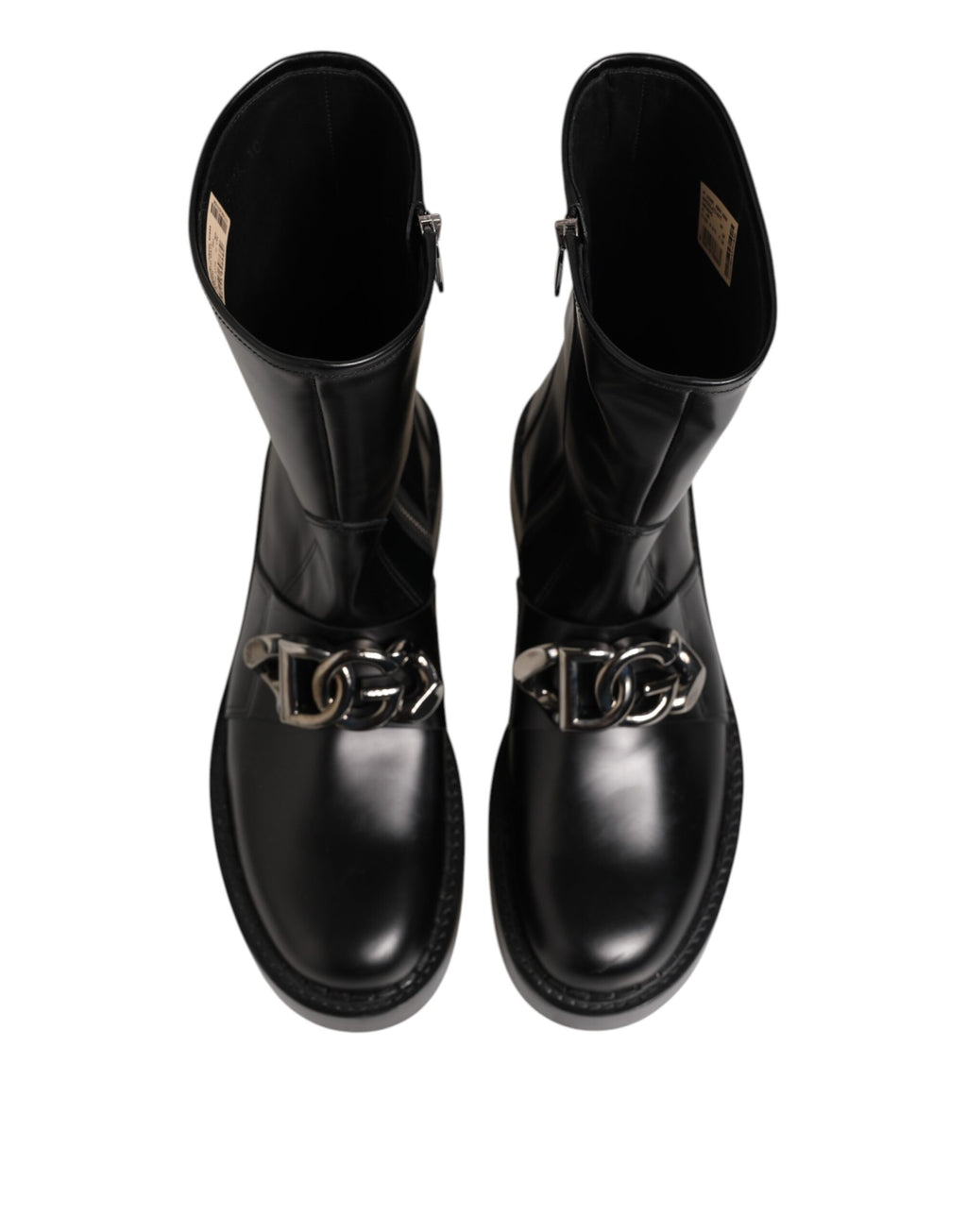 Chaussures bottines mi-mollet Dolce & Gabbana noires avec plaque logo, style motard, en cuir avec détails robustes et semelle solide.