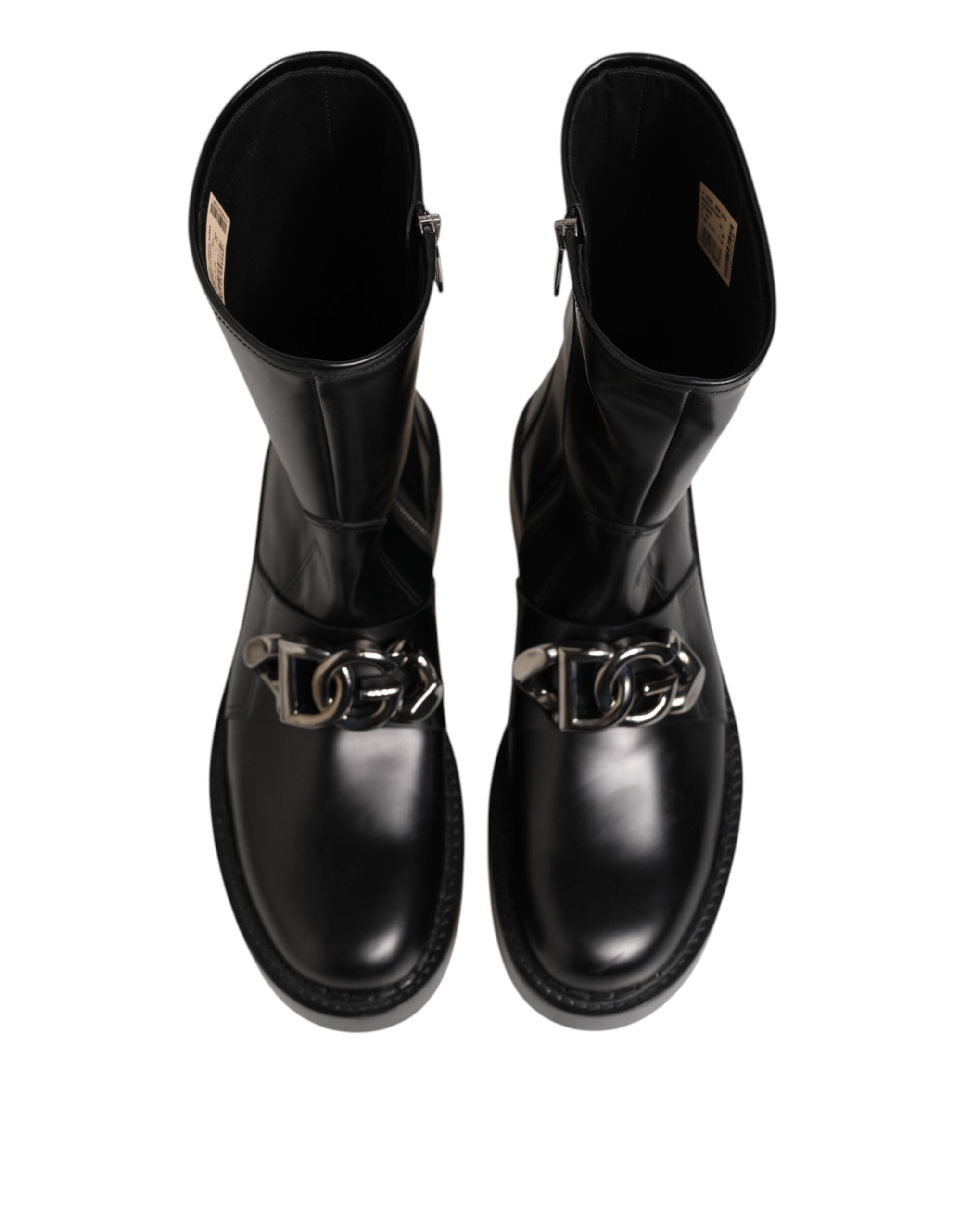 Chaussures bottines mi-mollet Dolce & Gabbana noires avec plaque logo, style motard, en cuir avec détails robustes et semelle solide.
