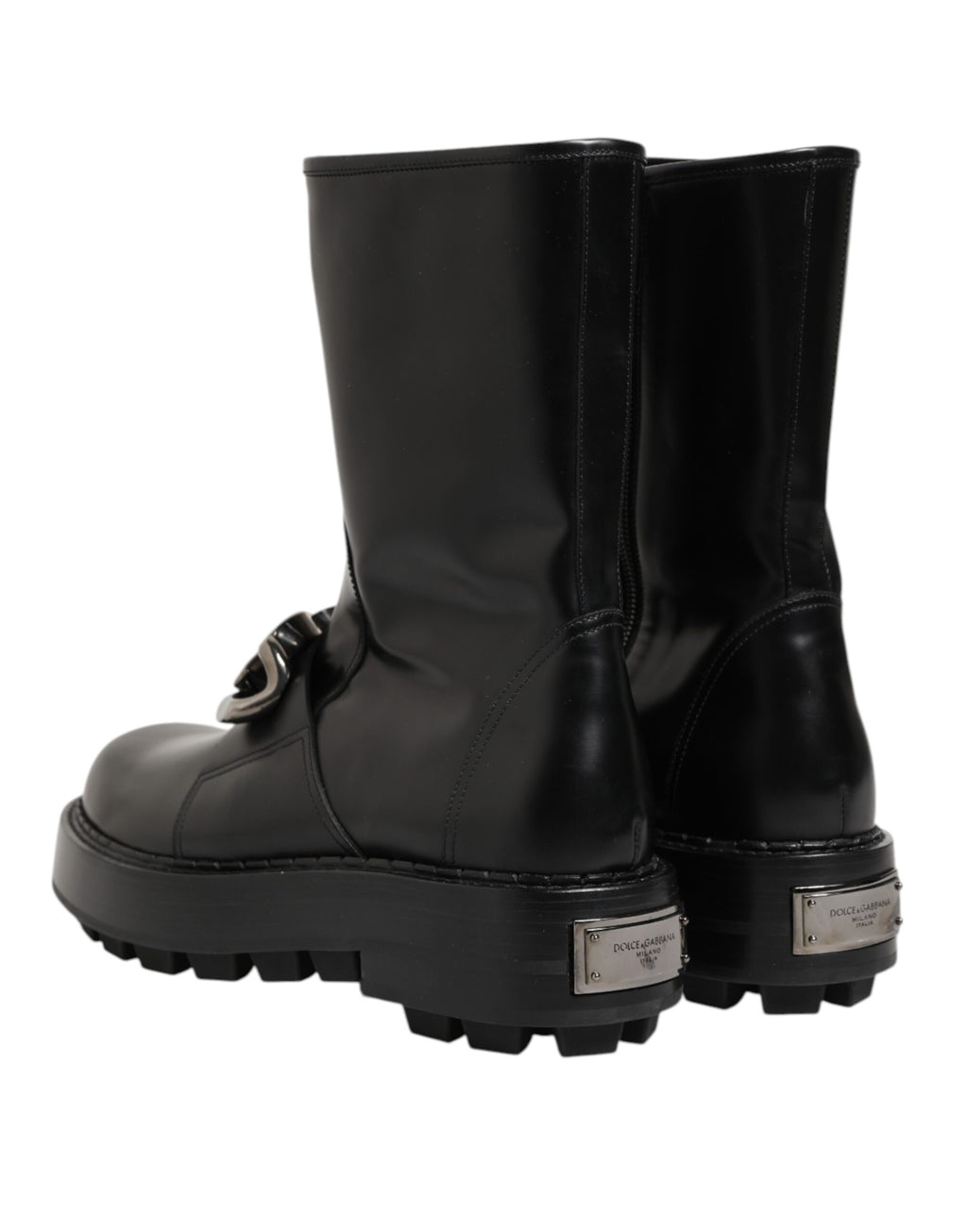 Bottes biker mi-mollet noires Dolce & Gabbana avec plaque logo en relief, style robuste et tendance.