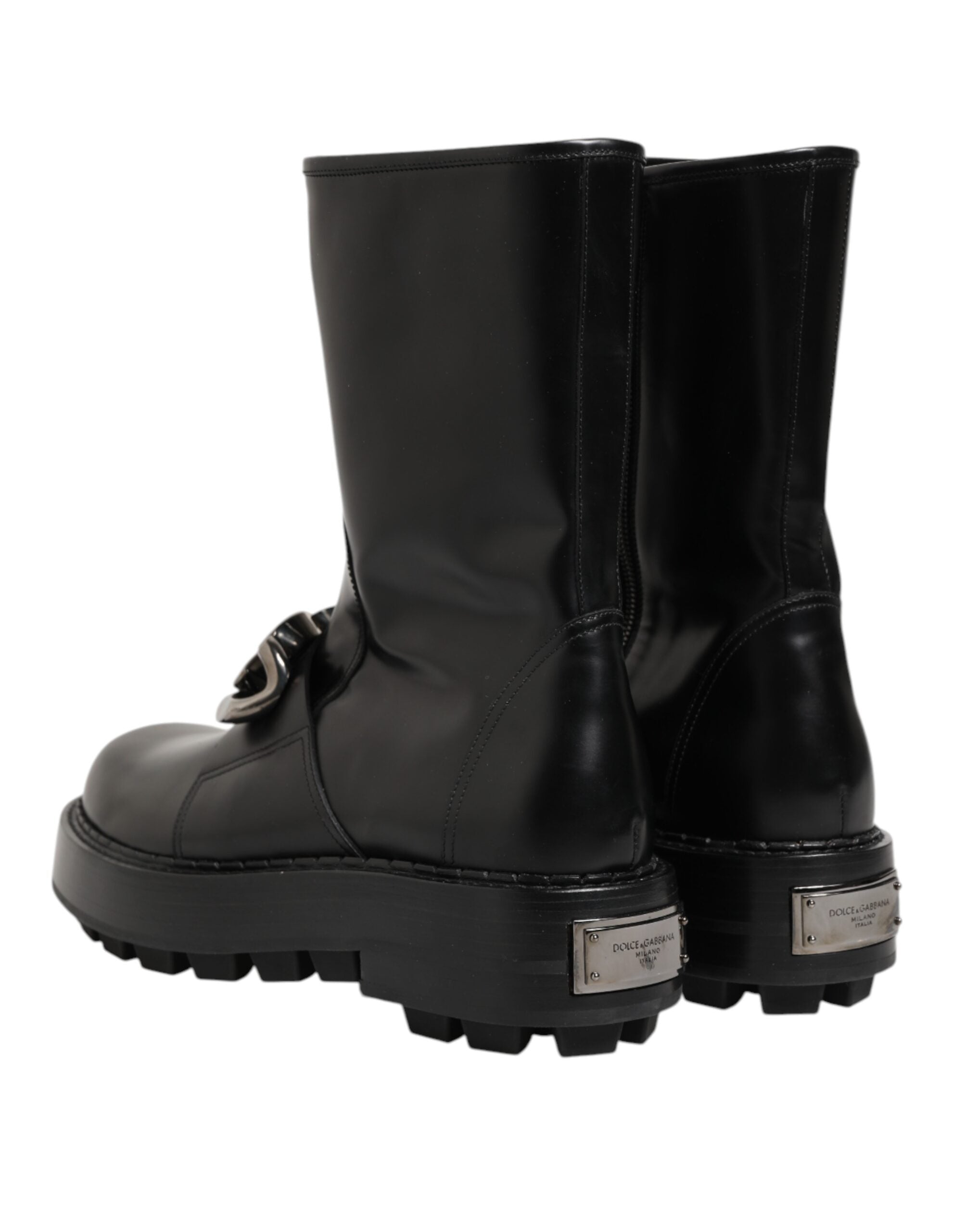 Bottes biker mi-mollet noires Dolce & Gabbana avec plaque logo en relief, style robuste et tendance.