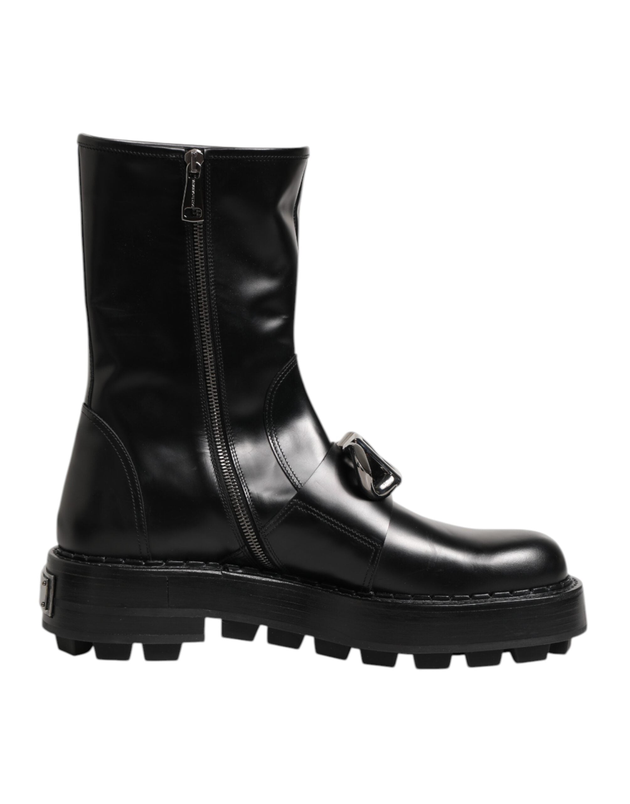 Bottes noires Dolce & Gabbana logo plaque mi-mollet, style biker avec semelle robuste et détails en cuir.