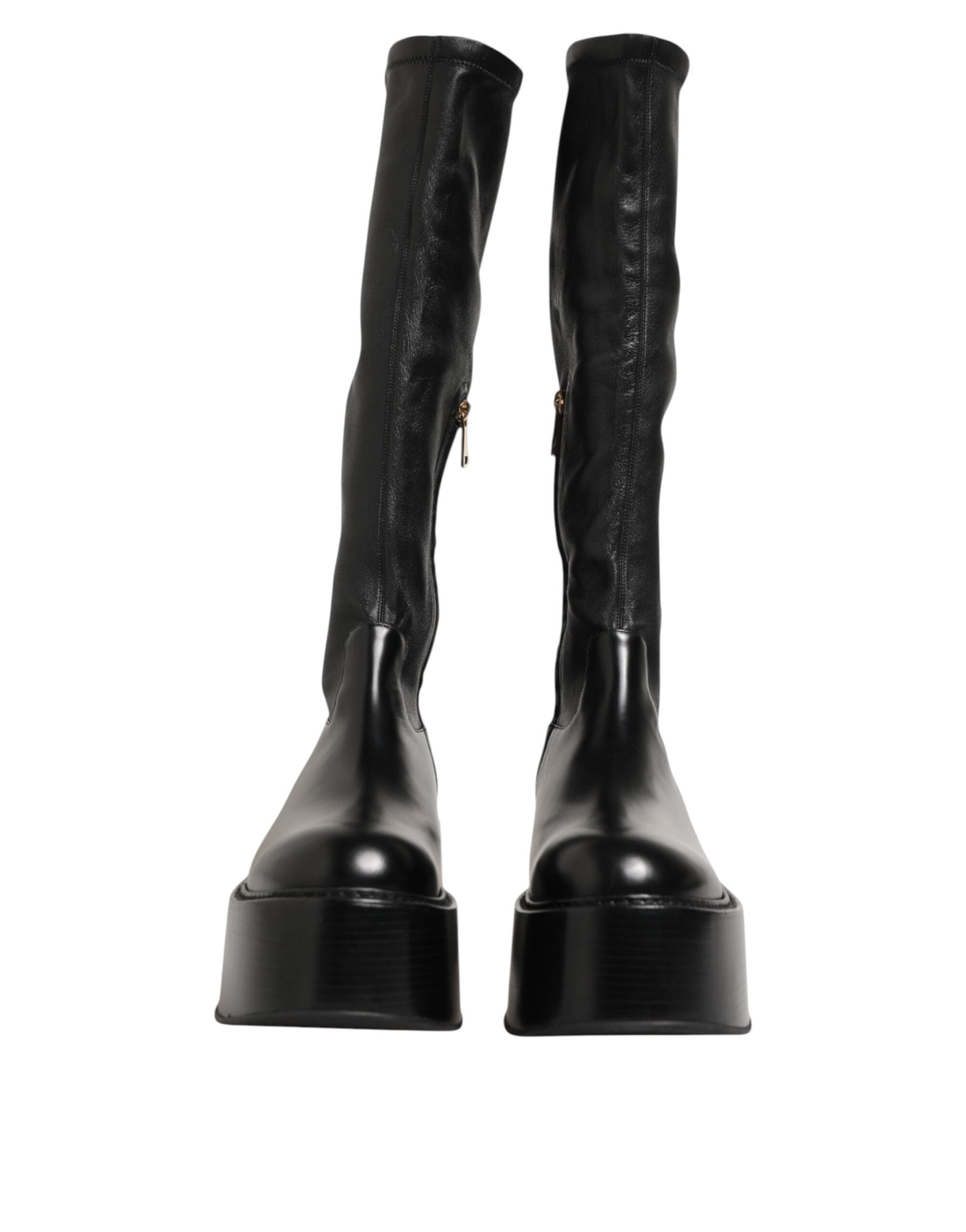Bottes hautes Dolce & Gabbana noires avec plaque logo, style over the calf, en cuir élégant et tendance.