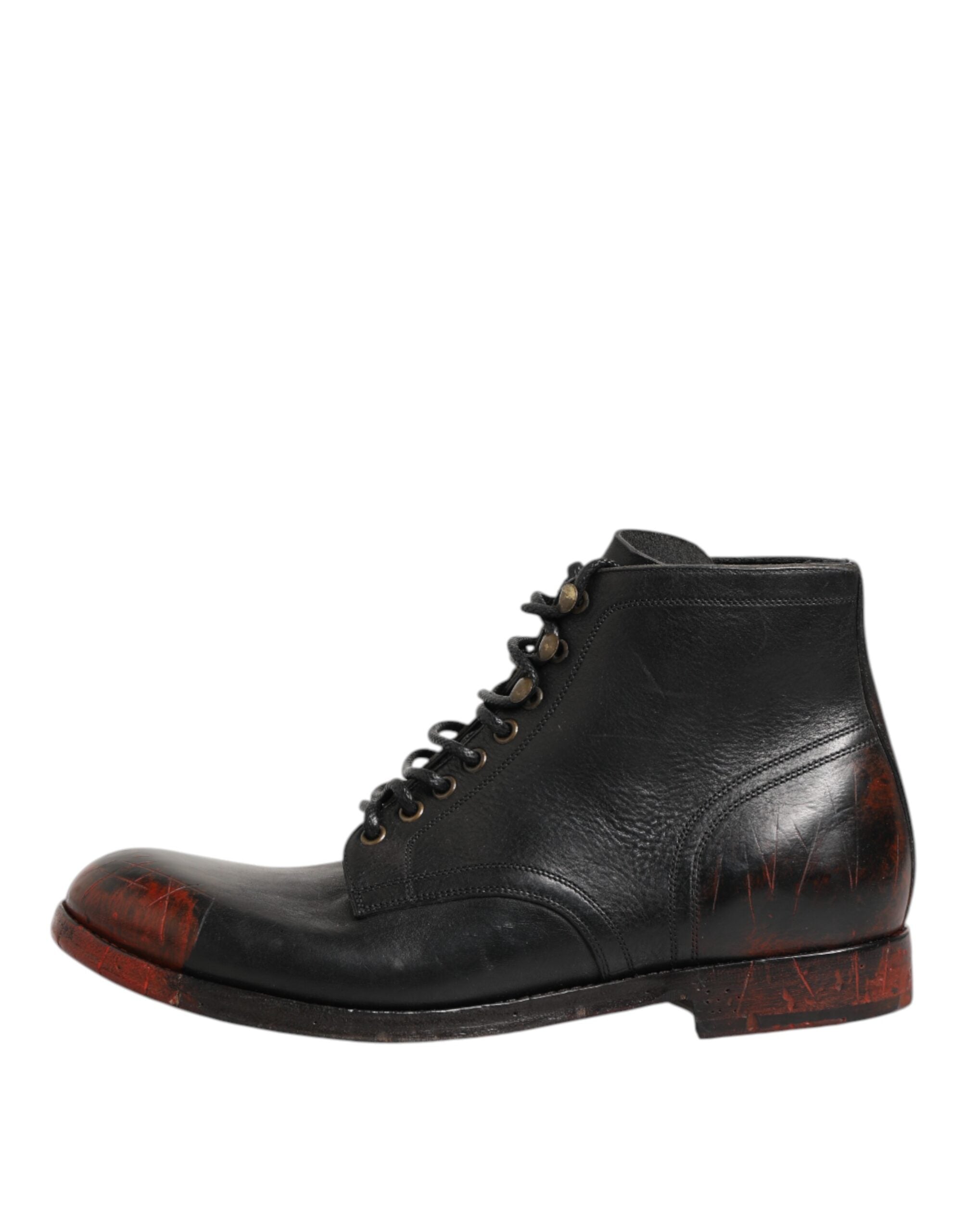 Bottines noires et rouges Dolce & Gabbana à lacets, courtes à la cheville, en cuir avec détails en dentelle.